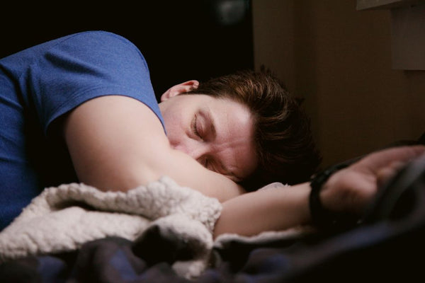 A man with balanced hormones sleeping soundly