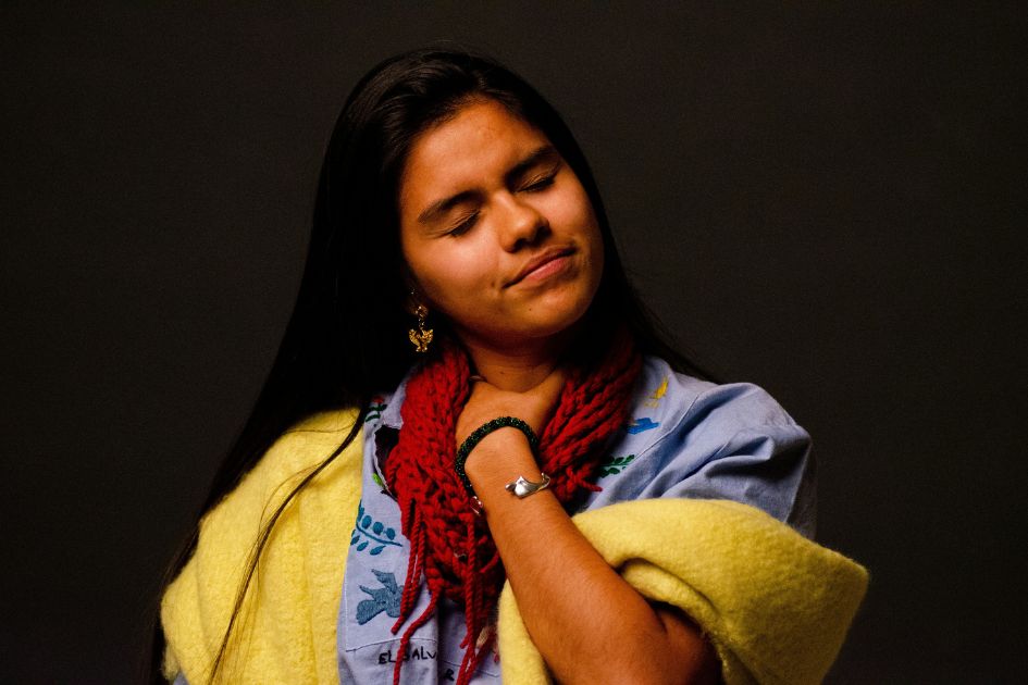 a woman rubbing her neck for neck pain relief