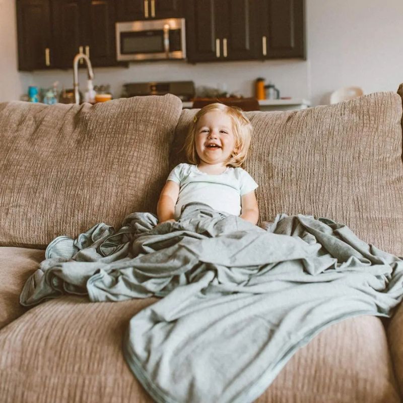 Child using premium cooling blanket - Restora Dream