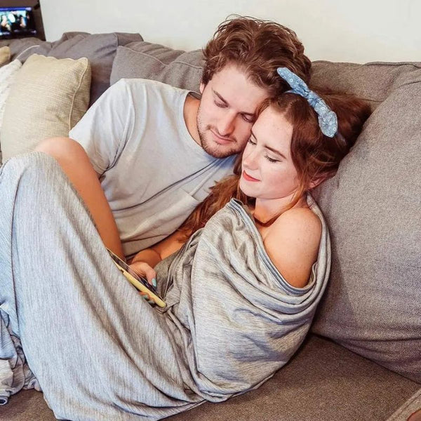 Couple using premium cooling blanket - Restora Dream