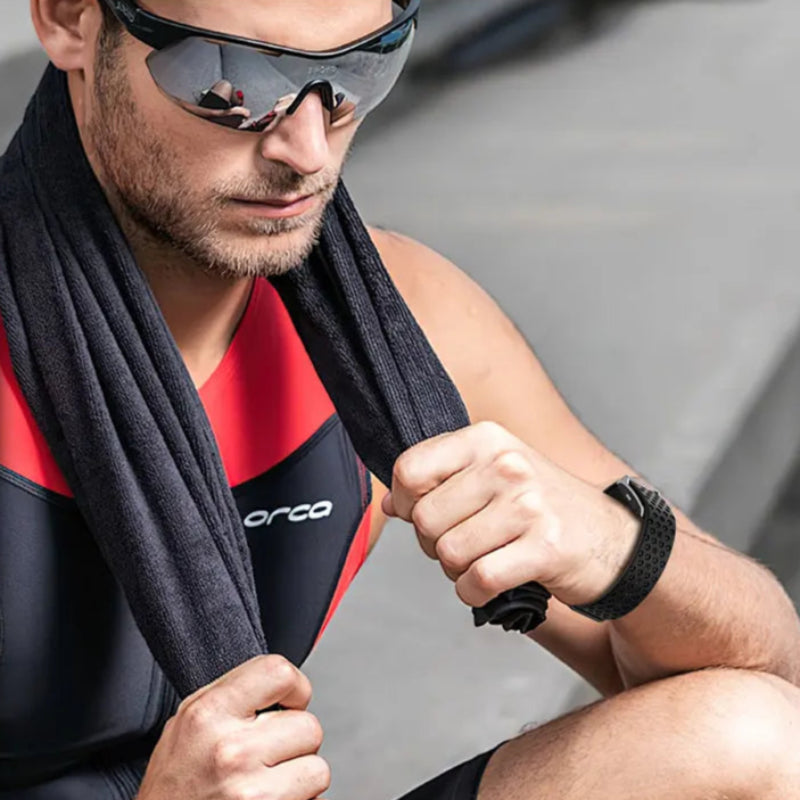 Heart rate monitor with user interface and person wearing Restora Dream Smart Sleep Band