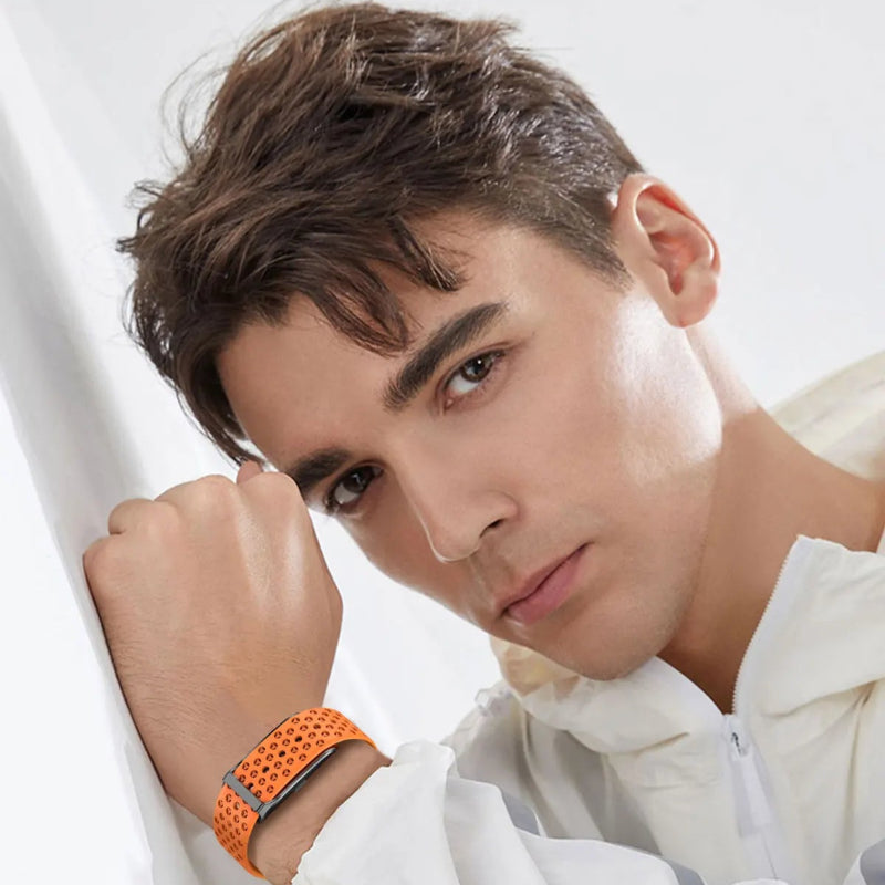 Man wearing the orange Smart Sleep Band from Restora Dream